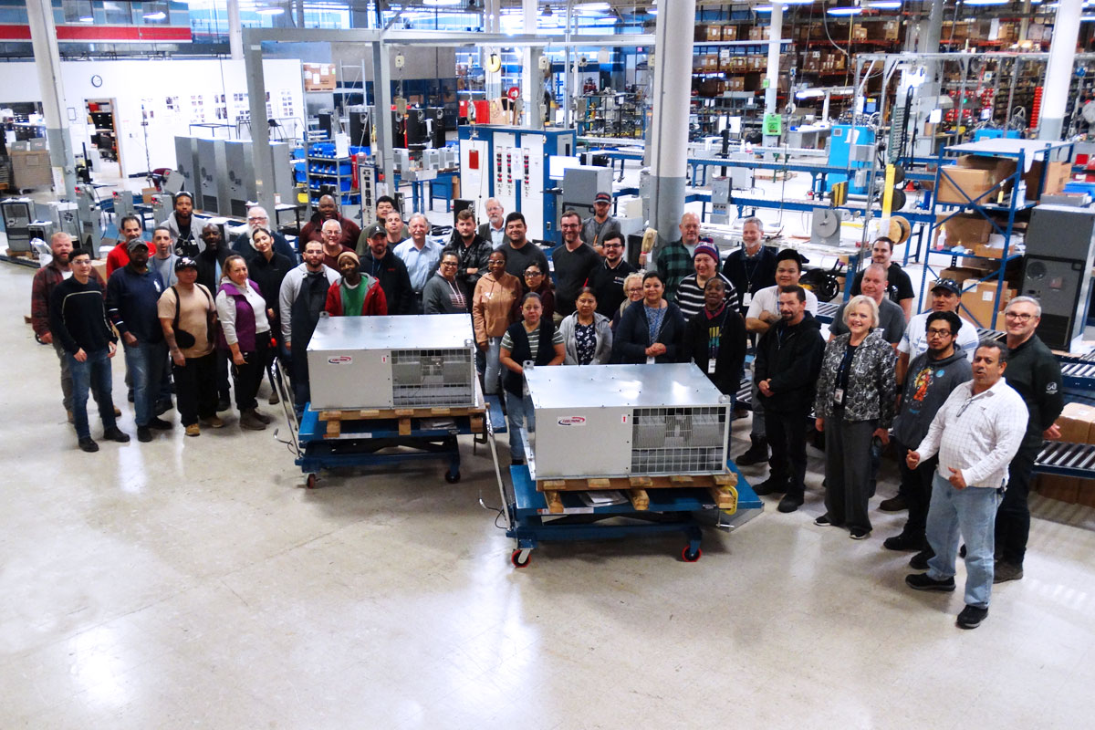Current employee gathering on the Kooltronic factory floor
